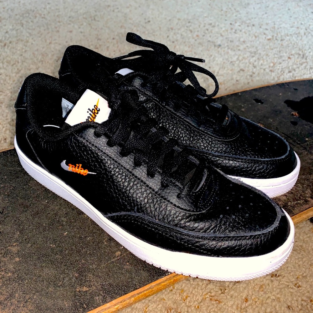 black, orange, white leather nike shoes !